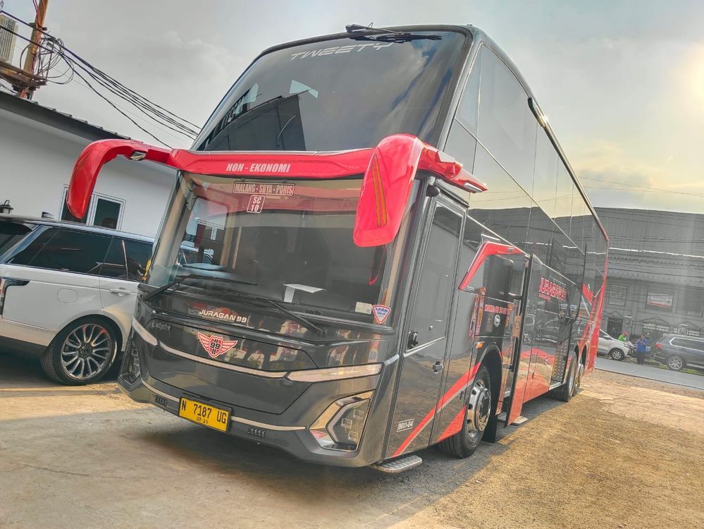 Juragan 99 Trans Jadi Pionir Bus Tingkat Full Sleeper Seat di Indonesia 